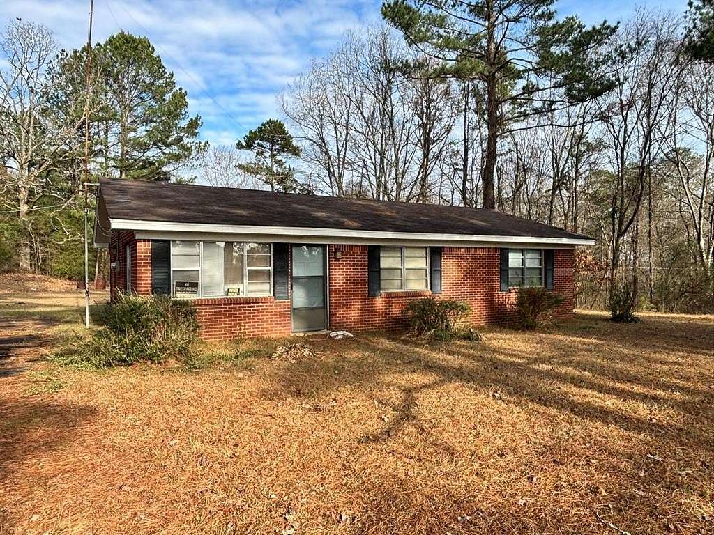 11.3 Acres of Land with Home for Sale in Coffeeville, Mississippi