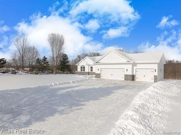 3 Acres of Land with Home for Sale in Atlas Township, Michigan