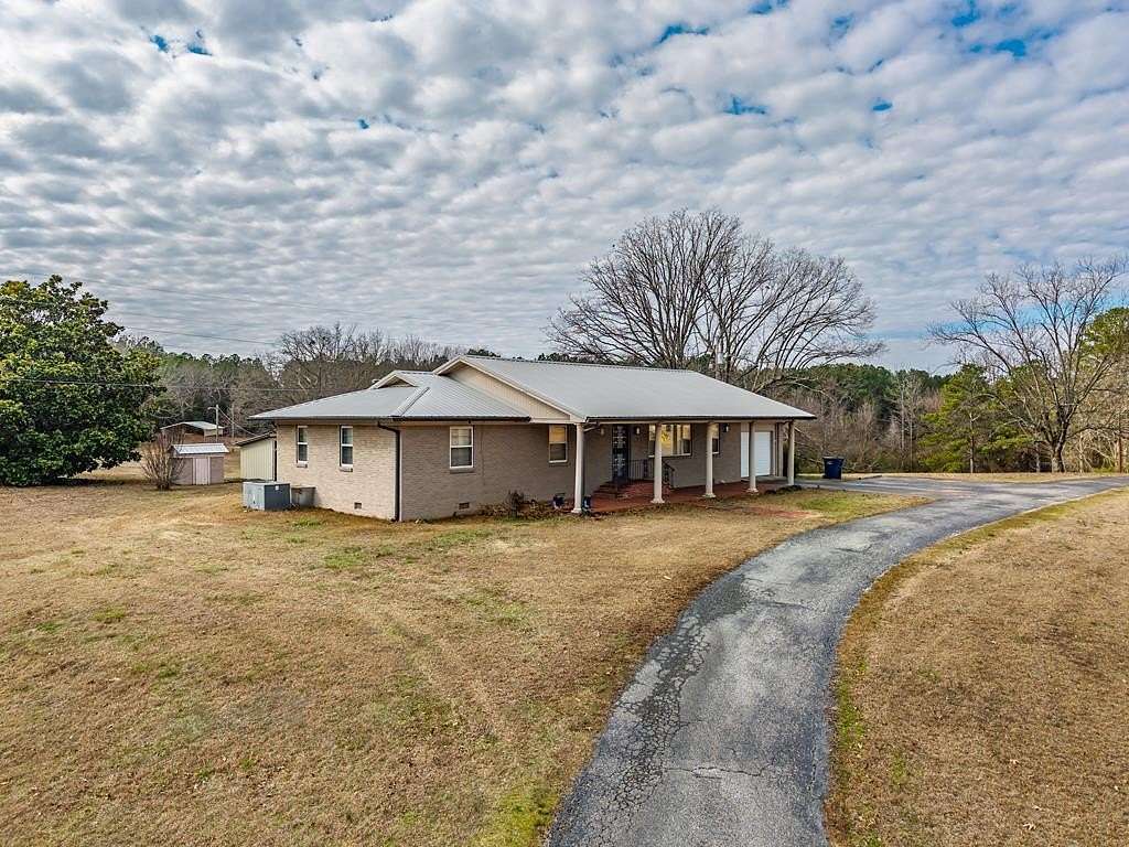 6.6 Acres of Residential Land with Home for Sale in Water Valley, Mississippi