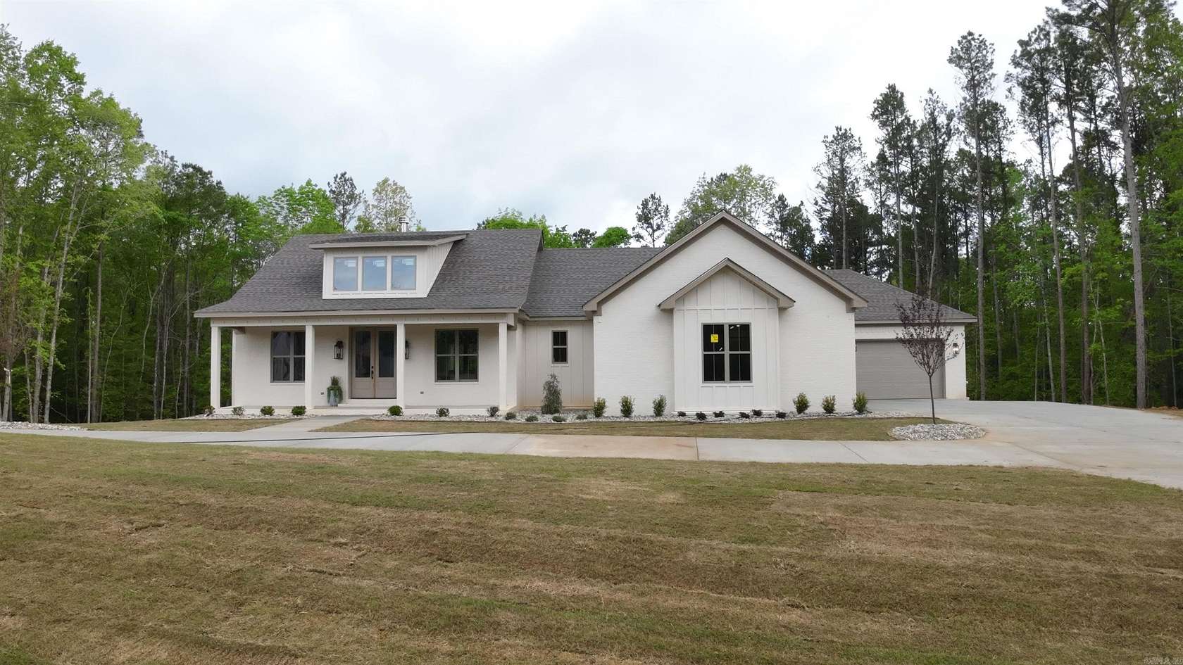 2.79 Acres of Land with Home for Sale in Benton, Arkansas