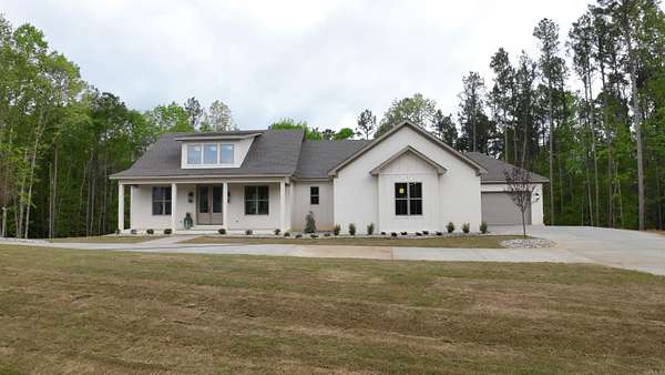 2.79 Acres of Land with Home for Sale in Benton, Arkansas