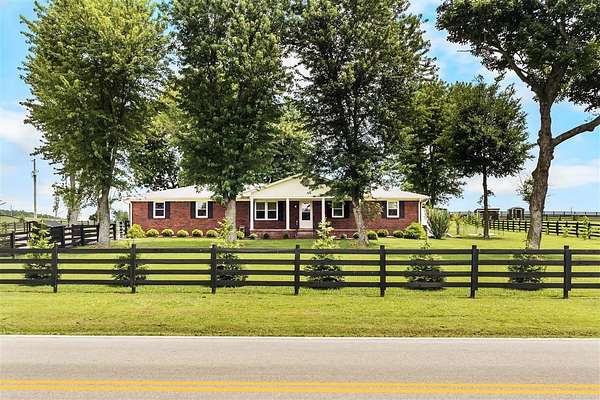 10.8 Acres of Land with Home for Sale in Glasgow, Kentucky