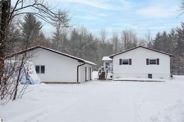 10 Acres of Recreational Land with Home for Sale in Kingsley, Michigan