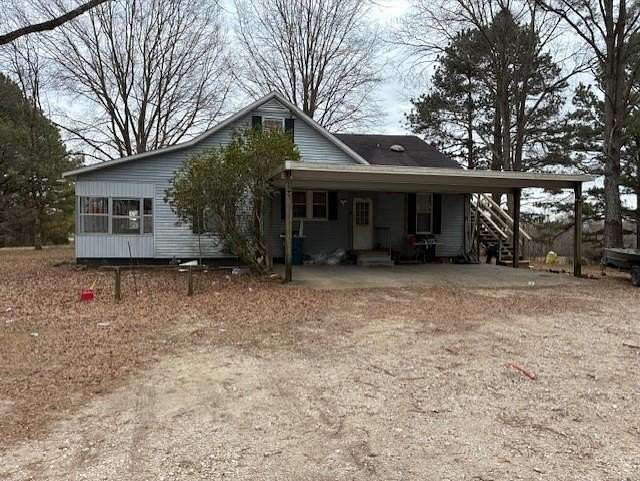 47 Acres of Agricultural Land with Home for Sale in McKenzie, Tennessee