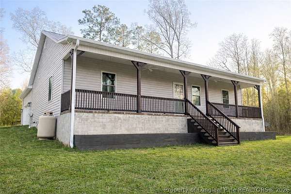 2.3 Acres of Land with Home for Sale in West End, North Carolina