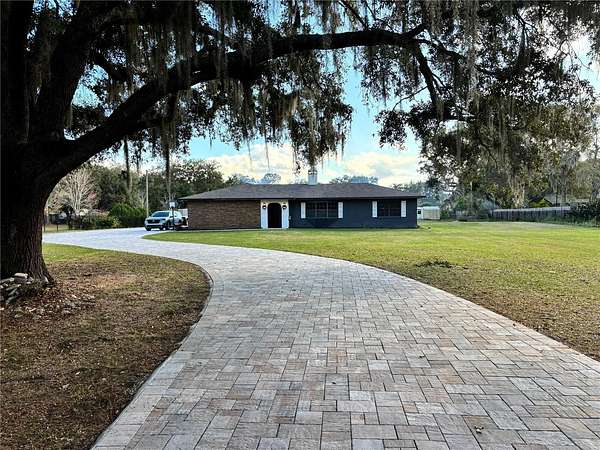 2.4 Acres of Residential Land with Home for Sale in Kissimmee, Florida