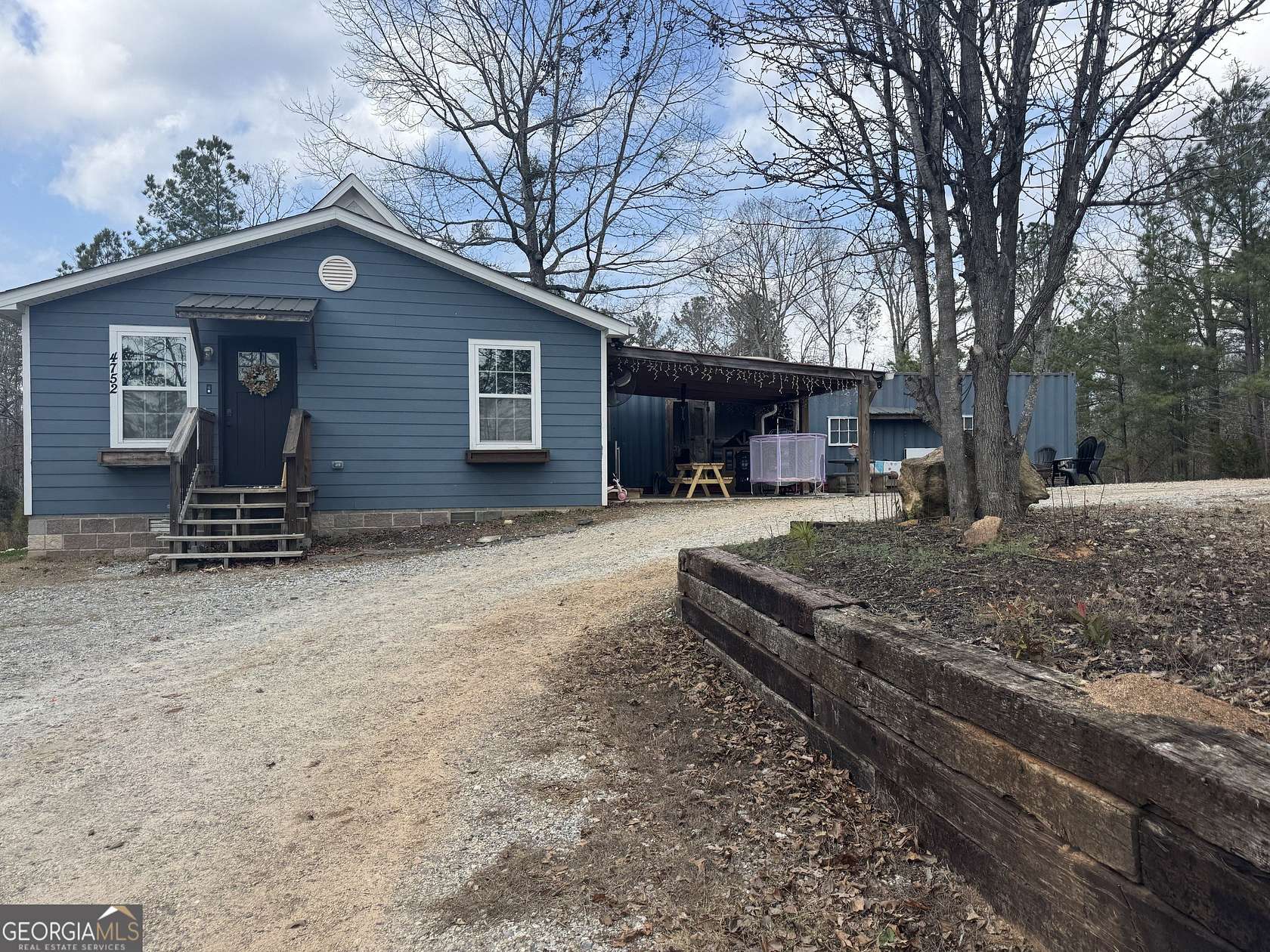 2.44 Acres of Land with Home for Sale in Mansfield, Georgia