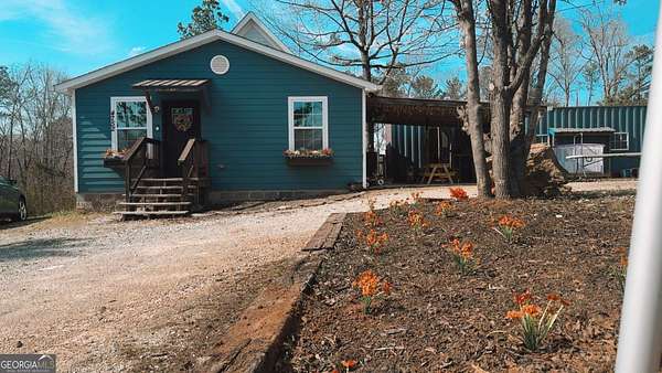 2.44 Acres of Land with Home for Sale in Mansfield, Georgia