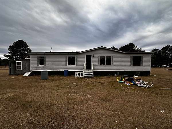 1.5 Acres of Land with Home for Sale in Latta, South Carolina