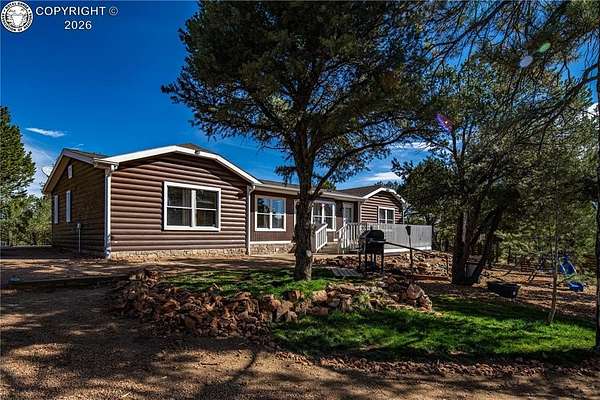 10.9 Acres of Land with Home for Sale in Cotopaxi, Colorado