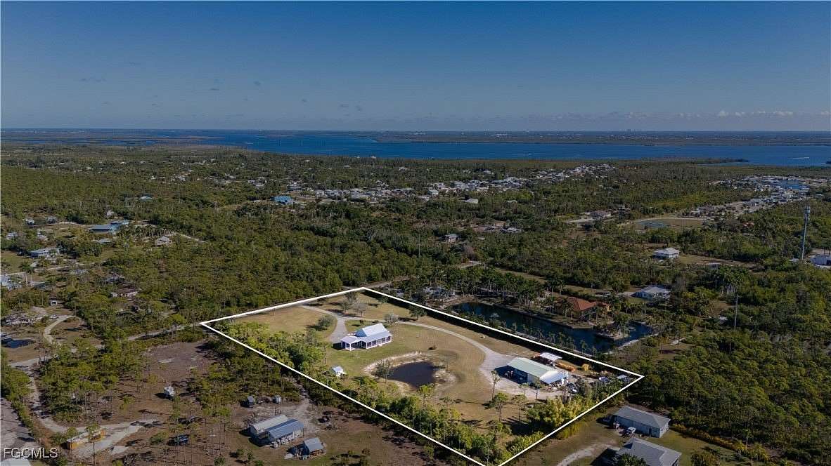 5 Acres of Residential Land with Home for Sale in St. James City, Florida