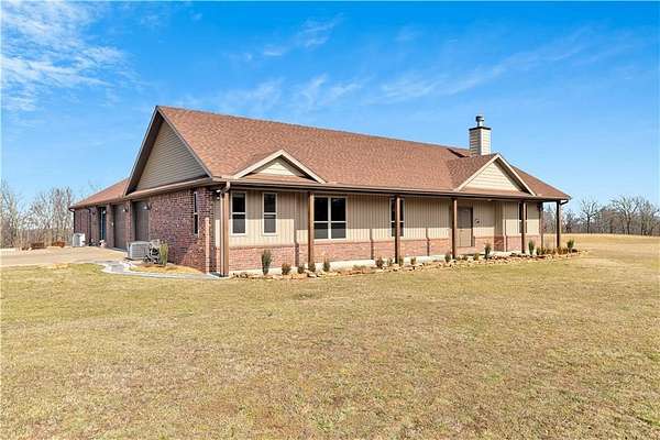 6.6 Acres of Residential Land with Home for Sale in Fayetteville, Arkansas