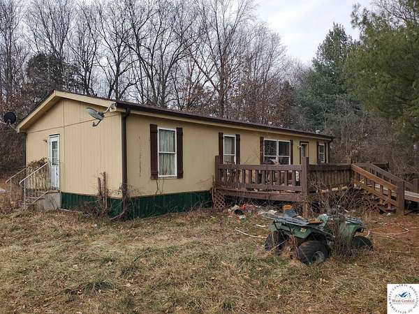 17.6 Acres of Land with Home for Sale in Clinton, Missouri