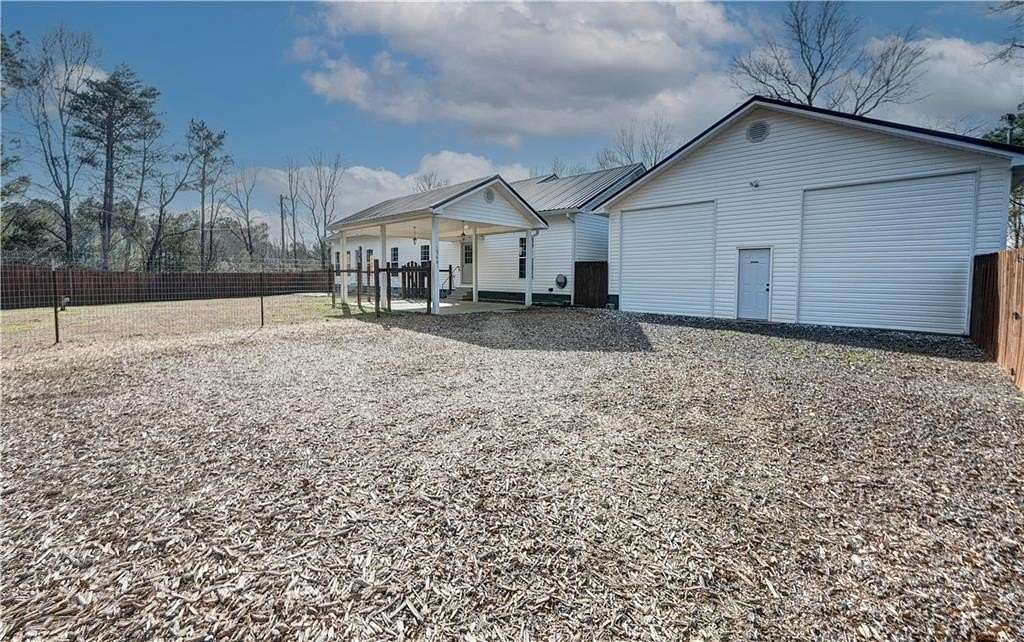 5.12 Acres of Land with Home for Sale in Calhoun, Georgia