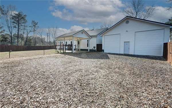 5.12 Acres of Land with Home for Sale in Calhoun, Georgia