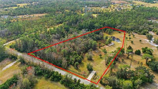 5.19 Acres of Residential Land with Home for Sale in Christmas, Florida