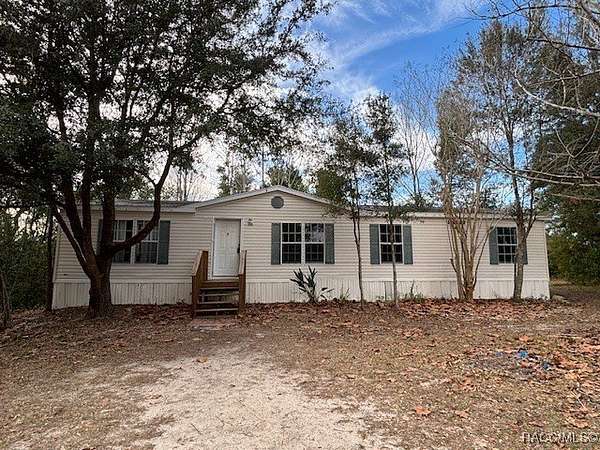 4.7 Acres of Residential Land with Home for Sale in Lecanto, Florida