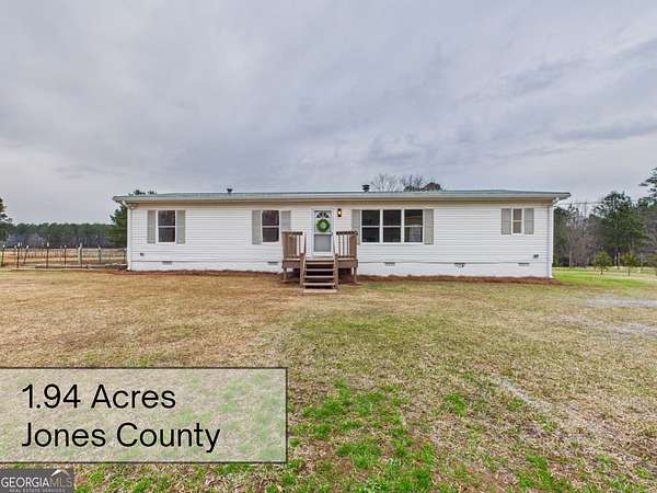 2 Acres of Residential Land with Home for Sale in Haddock, Georgia