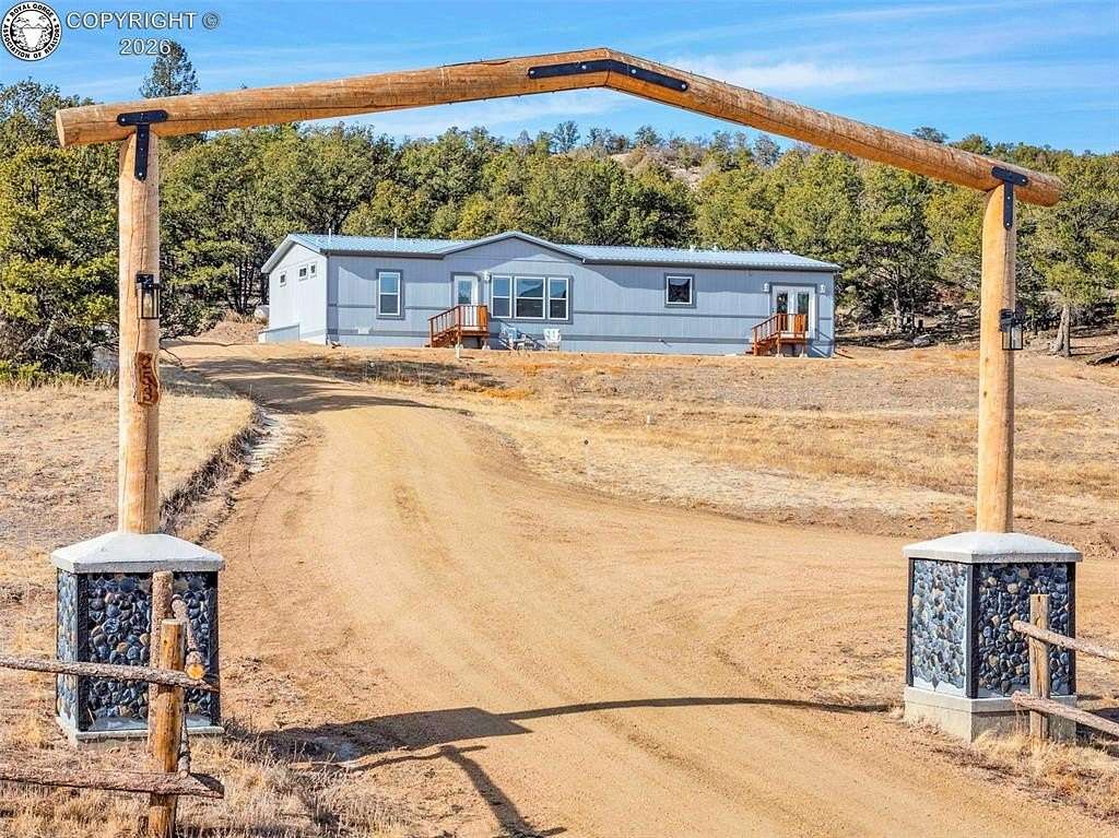 5.5 Acres of Residential Land with Home for Sale in Cotopaxi, Colorado