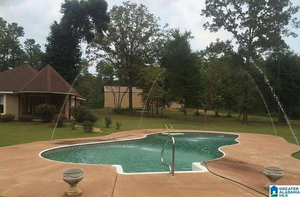 12.9 Acres of Land with Home for Sale in Alpine, Alabama