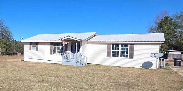 19.7 Acres of Land with Home for Sale in Irvington, Alabama