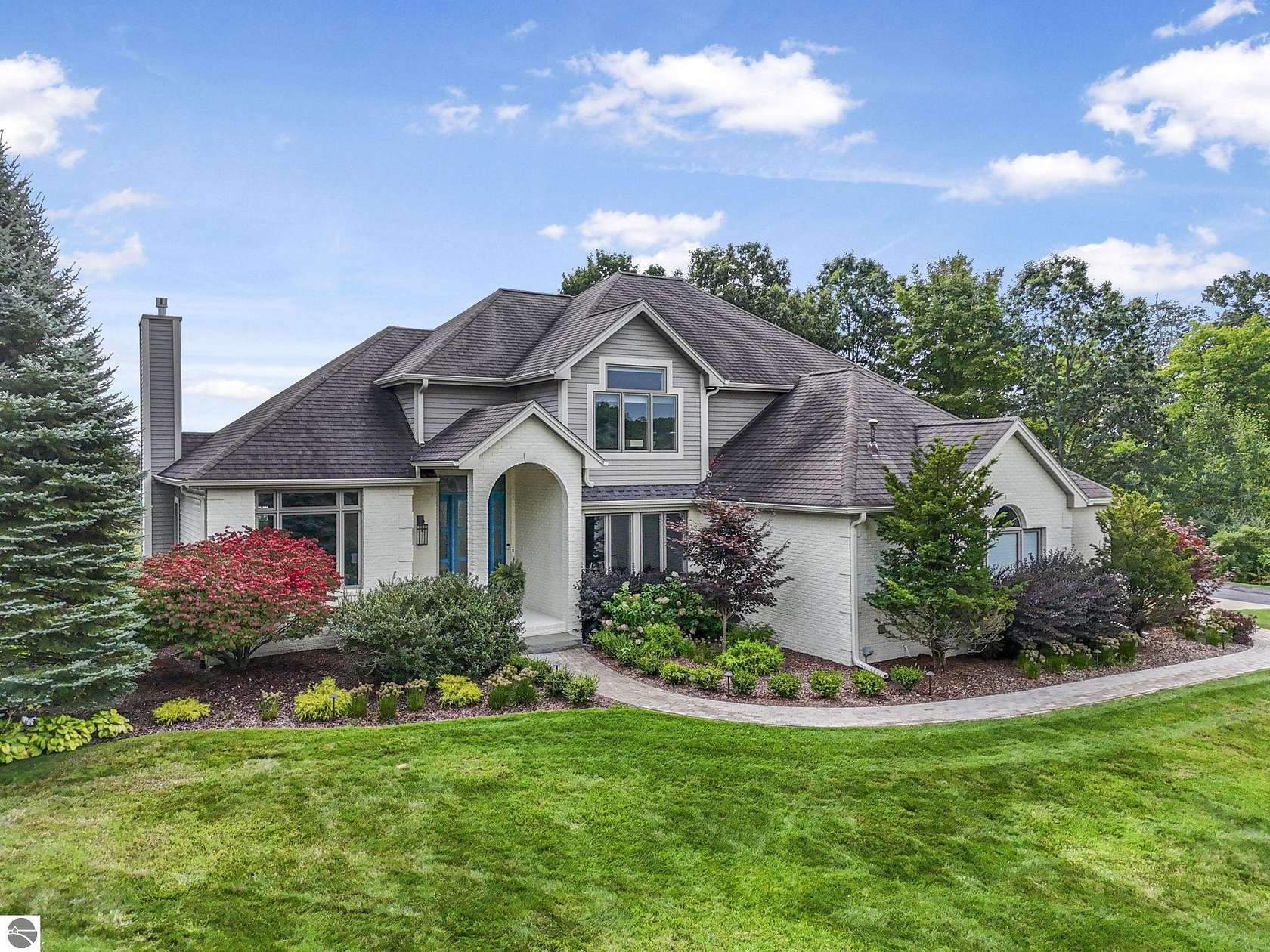 1.57 Acres of Residential Land with Home for Sale in Traverse City, Michigan