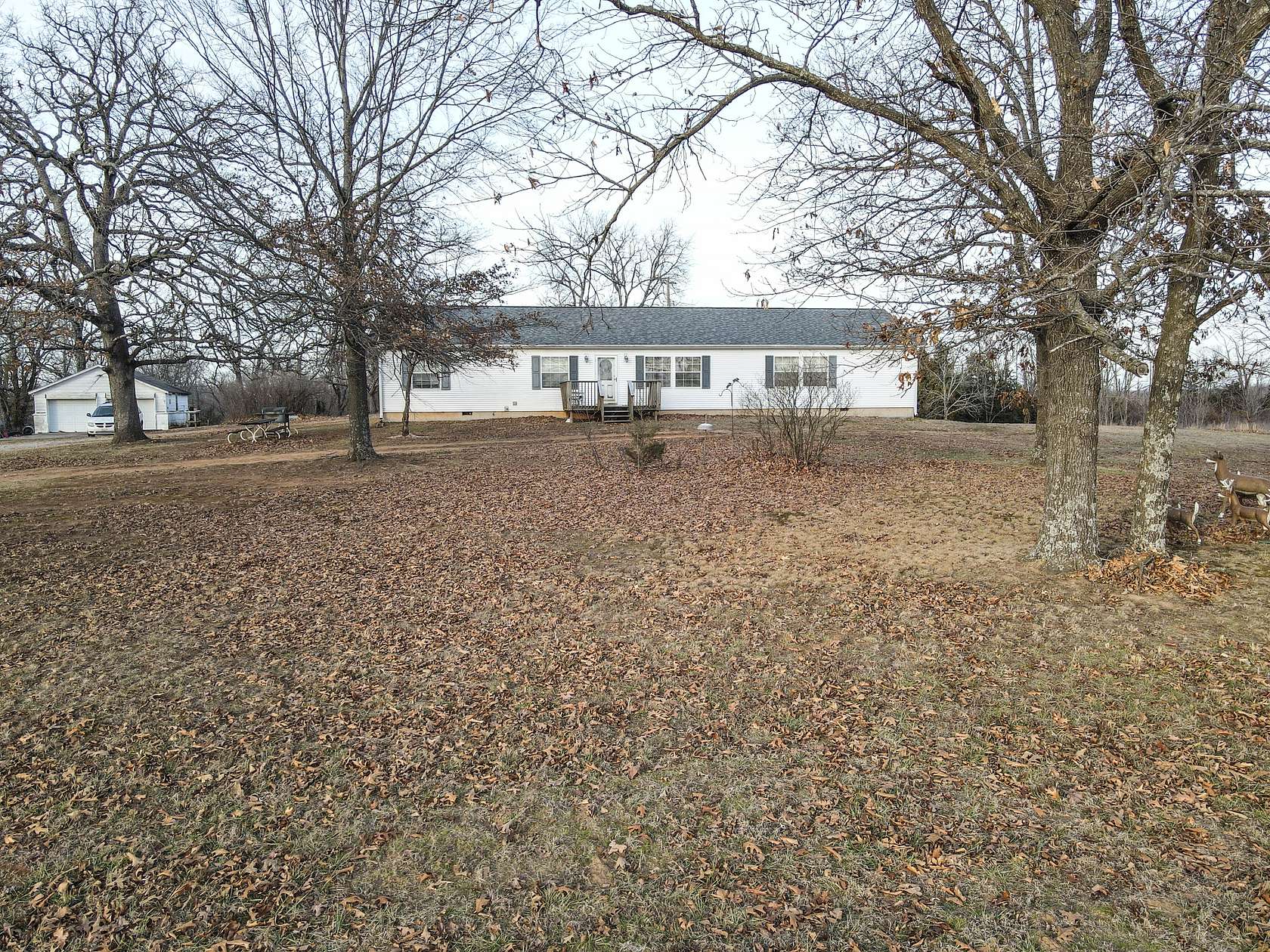 76.1 Acres of Recreational Land with Home for Sale in Collins, Missouri