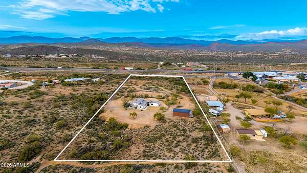 4.79 Acres of Land with Home for Sale in Wickenburg, Arizona