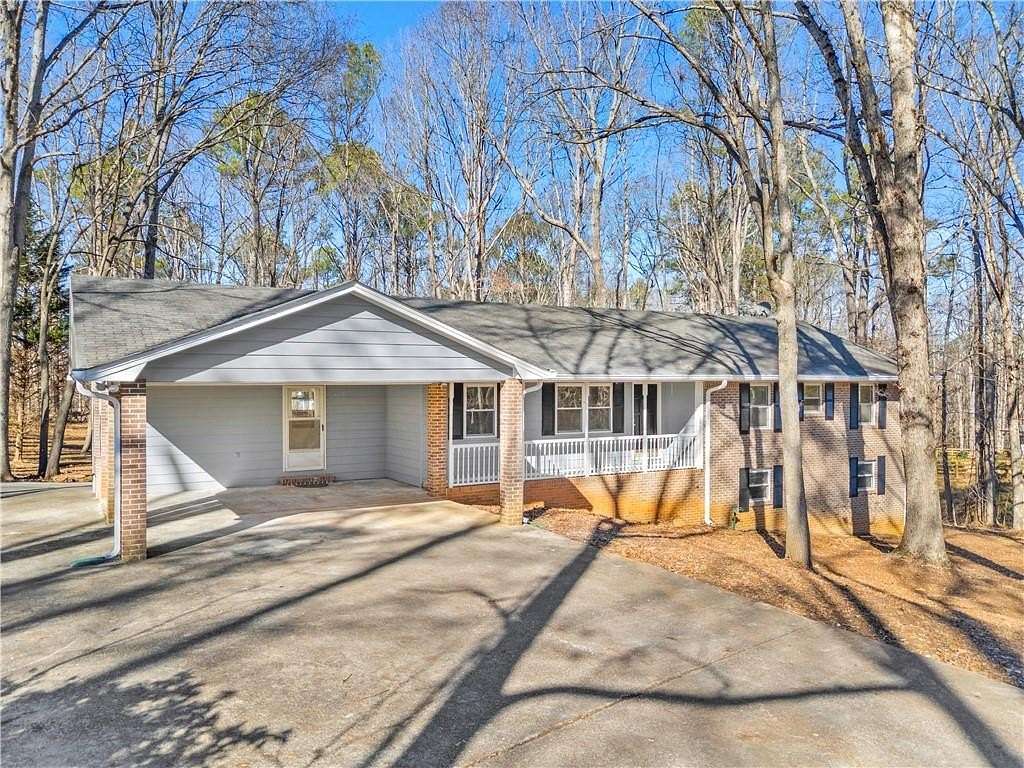 5.22 Acres of Residential Land with Home for Sale in Suwanee, Georgia