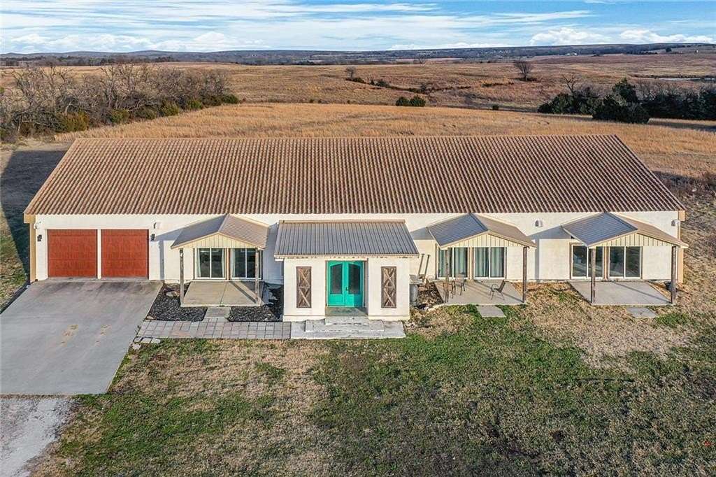 54 Acres of Land with Home for Sale in Independence, Kansas