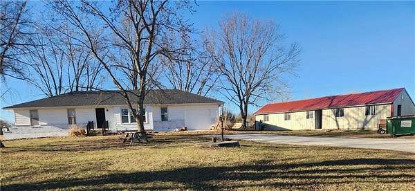 39.3 Acres of Land with Home for Sale in Archie, Missouri