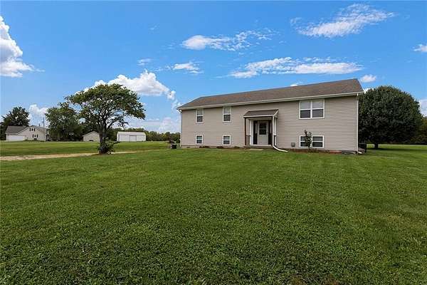 4.5 Acres of Residential Land with Home for Sale in Peculiar, Missouri