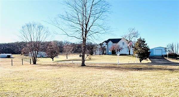 10 Acres of Land with Home for Sale in Buckner, Missouri