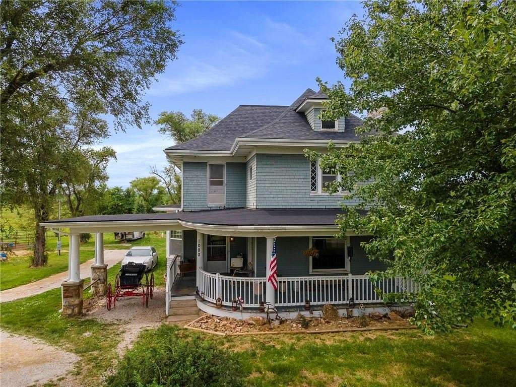 20 Acres of Agricultural Land with Home for Sale in Holden, Missouri