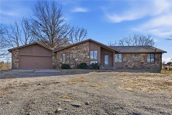 14.6 Acres of Land with Home for Sale in Edgerton, Missouri