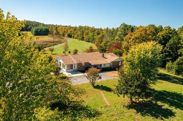 5.64 Acres of Land with Home for Sale in Palmer, Tennessee