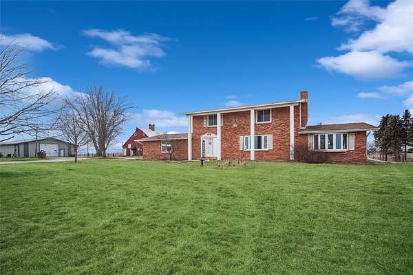 6.46 Acres of Land with Home for Sale in Stuart, Iowa