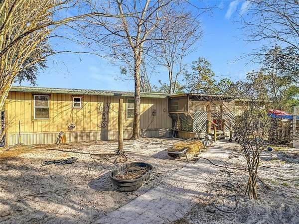 2.5 Acres of Residential Land with Home for Sale in DeLand, Florida