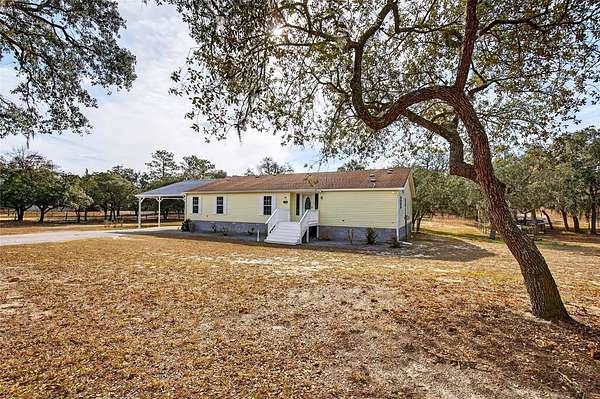 2.57 Acres of Residential Land with Home for Sale in Dunnellon, Florida