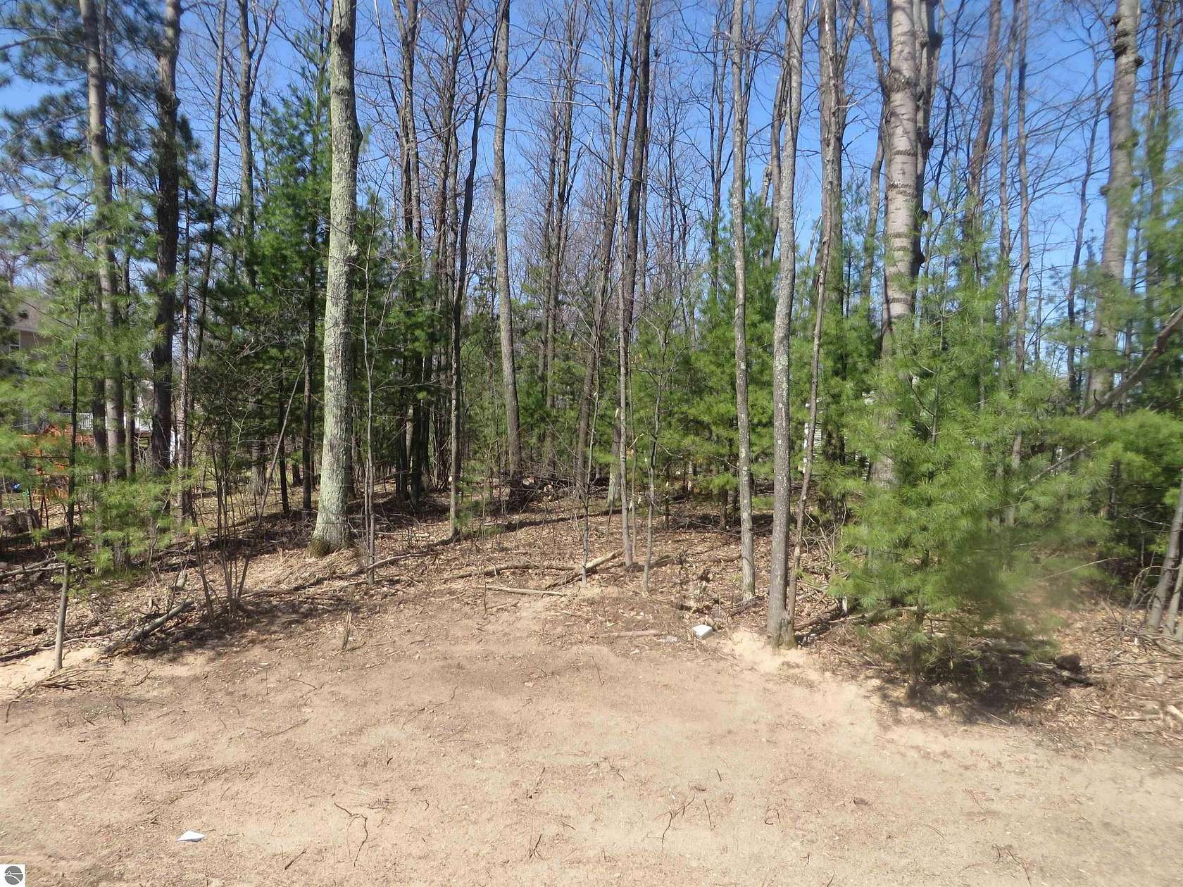 0.87 Acres of Residential Land for Sale in Grawn, Michigan