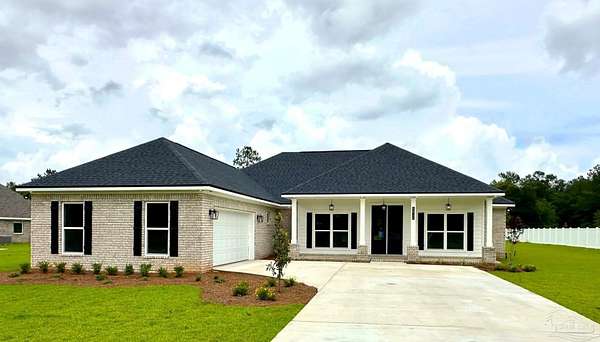 2.17 Acres of Land with Home for Sale in Pace, Florida