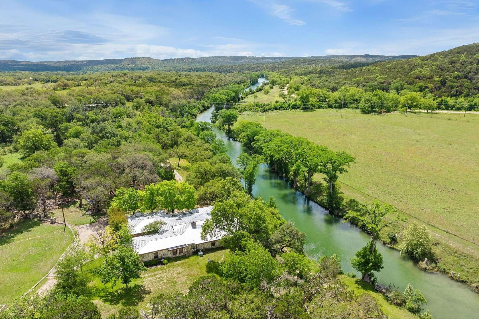 67.8 Acres of Recreational Land with Home for Sale in Wimberley, Texas