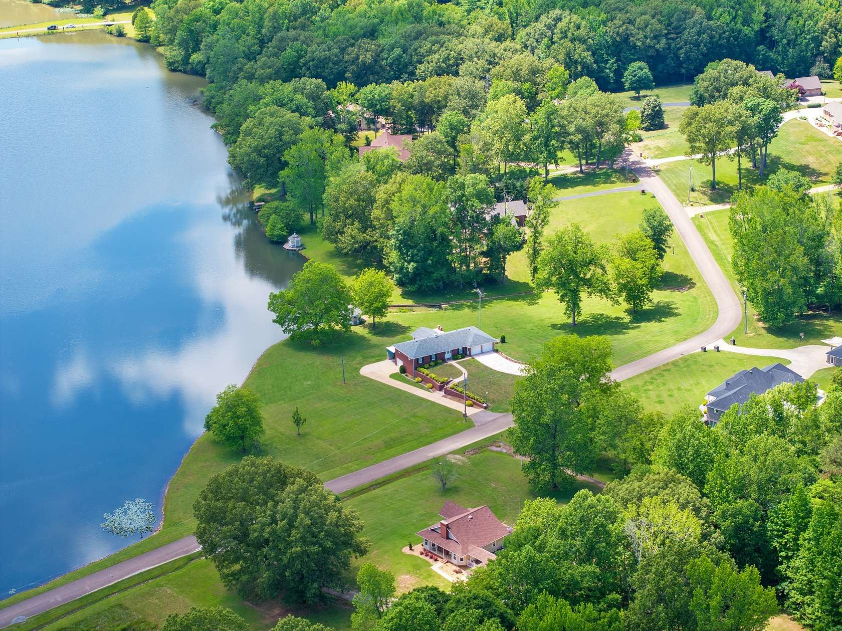 2 Acres of Residential Land with Home for Sale in Camden, Tennessee