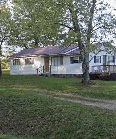 0.67 Acres of Residential Land with Home for Sale in Oldfort, Tennessee