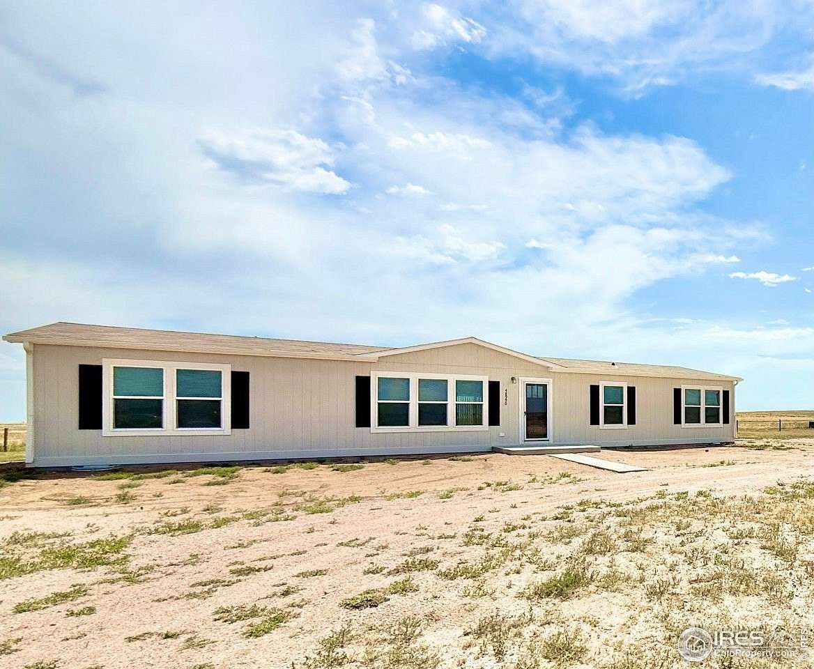 36 Acres of Land with Home for Sale in Briggsdale, Colorado