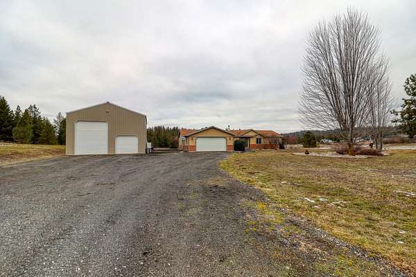 12.5 Acres of Land with Home for Sale in Chattaroy, Washington