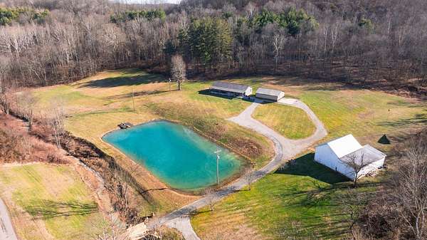 14.3 Acres of Recreational Land with Home for Sale in Cheshire, Ohio