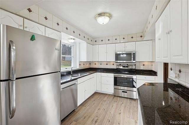 3.68 Acres of Residential Land with Home for Sale in Fowlerville, Michigan