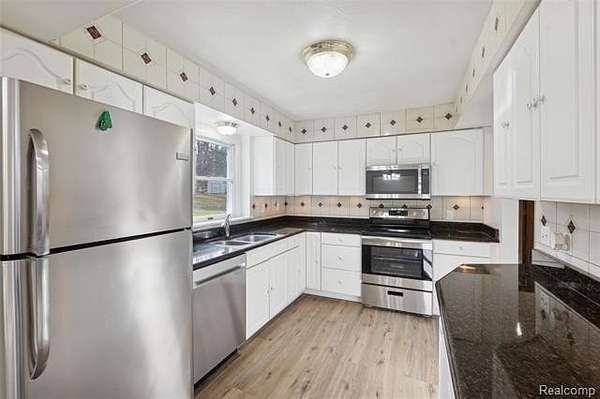 3.68 Acres of Residential Land with Home for Sale in Fowlerville, Michigan