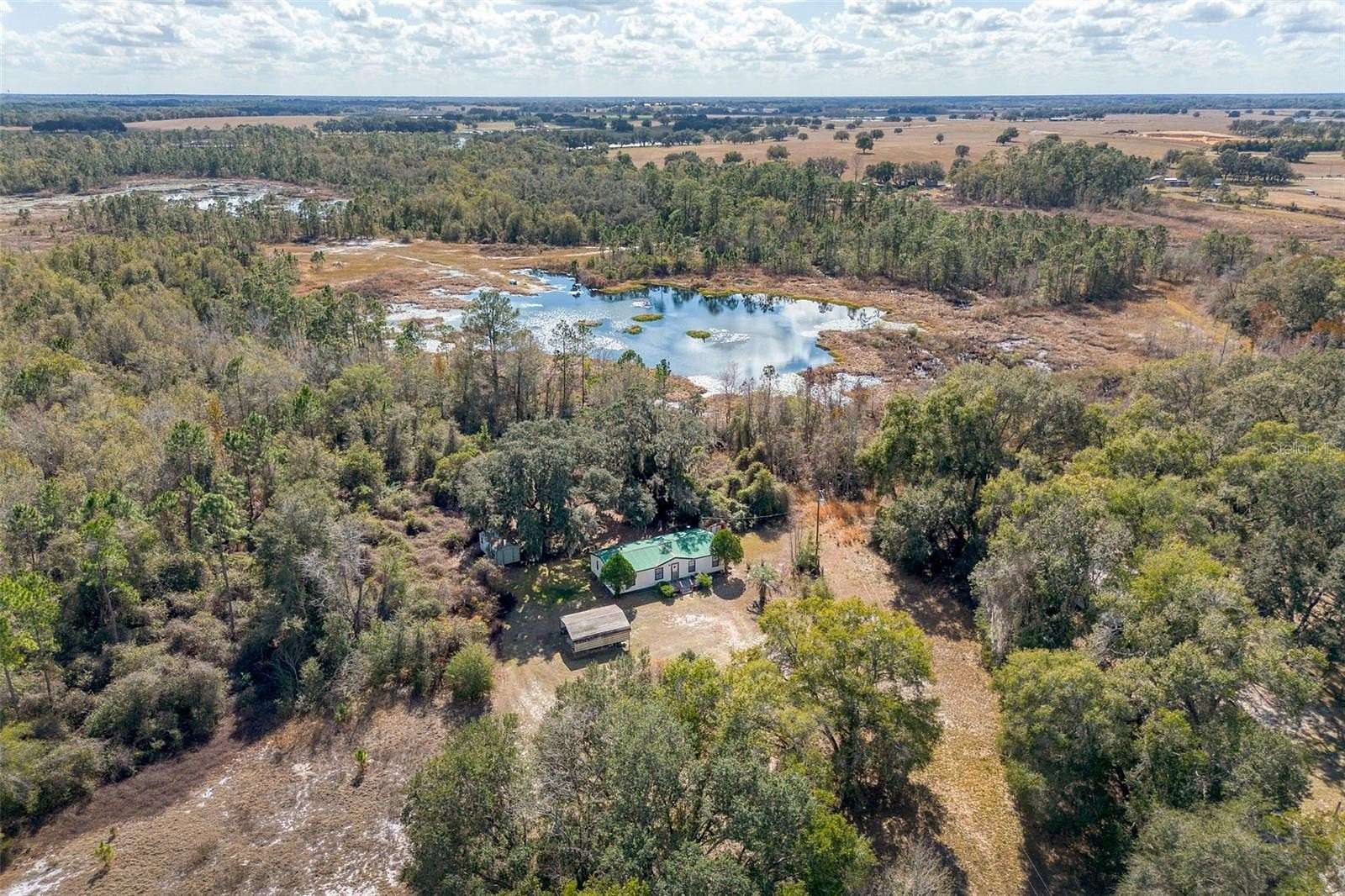 10.3 Acres of Land with Home for Sale in Groveland, Florida